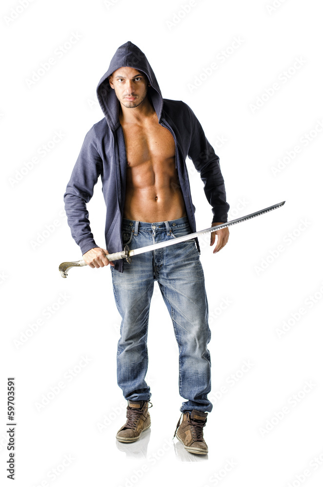 Young man wearing open sweatshirt, with japanese sword