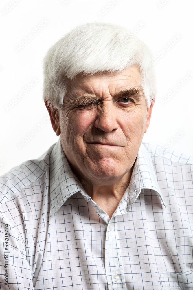 Portrait of a mature man making faces over white Portrait of a mature man making faces over white