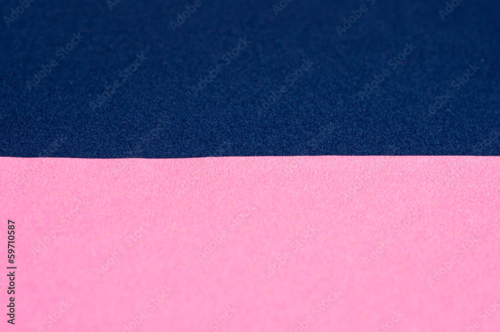 Paper background of pink and dark blue color Paper background of pink and dark blue color