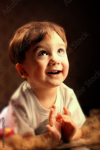 Portrait of a surprised little boy