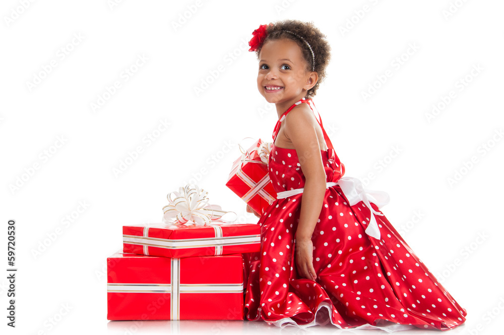 Happy little girl with a gift in hands. Happy little girl with a gift in hands.