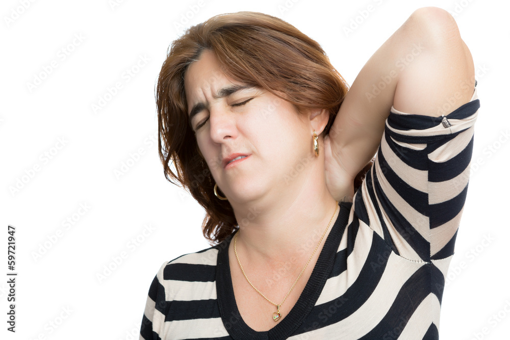 Hispanic woman suffering from neck or cervical pain i Hispanic woman suffering from neck or cervical pain i