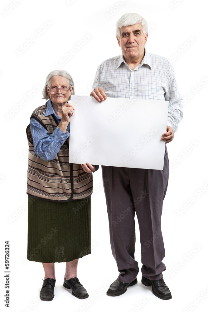 Senior woman and mature man holding holding a blank billboard Senior woman and mature man holding holding a blank billboard