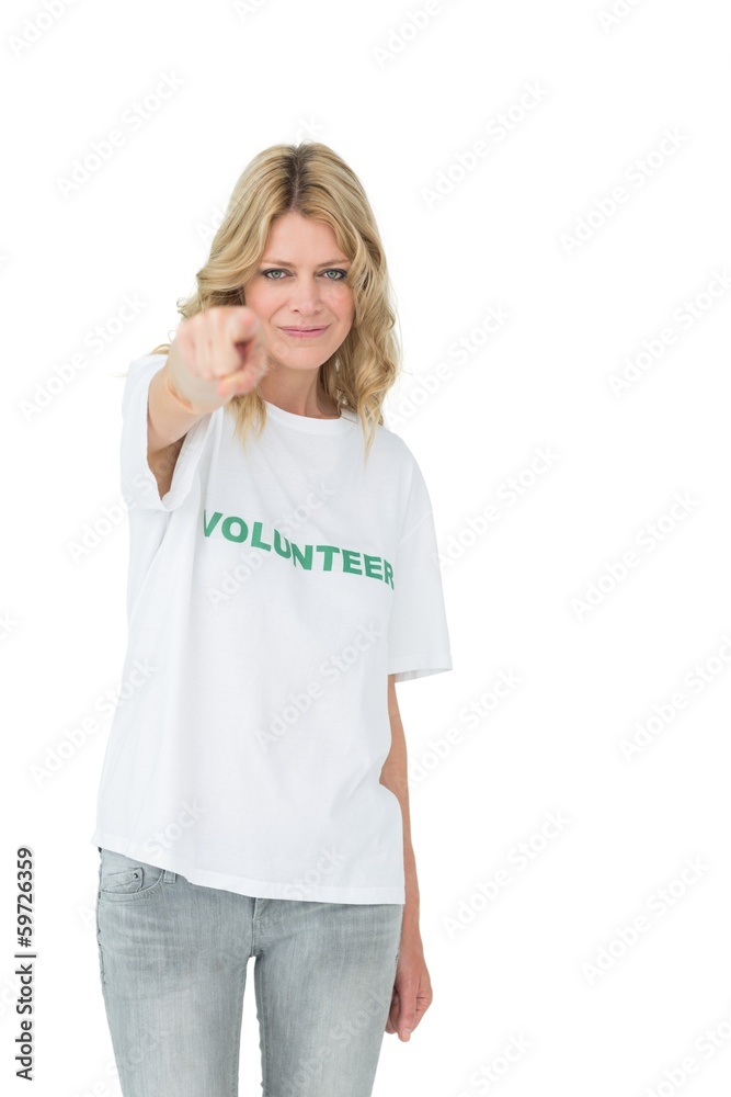 Portrait of a happy female volunteer pointing at you Portrait of a happy female volunteer pointing at you