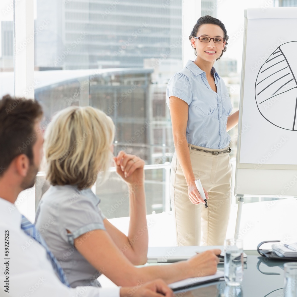Business people in office at presentation Business people in office at presentation