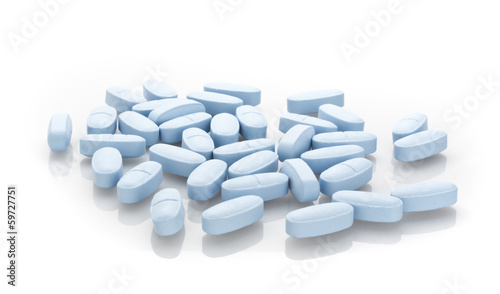 Blue pills isolated on white background
