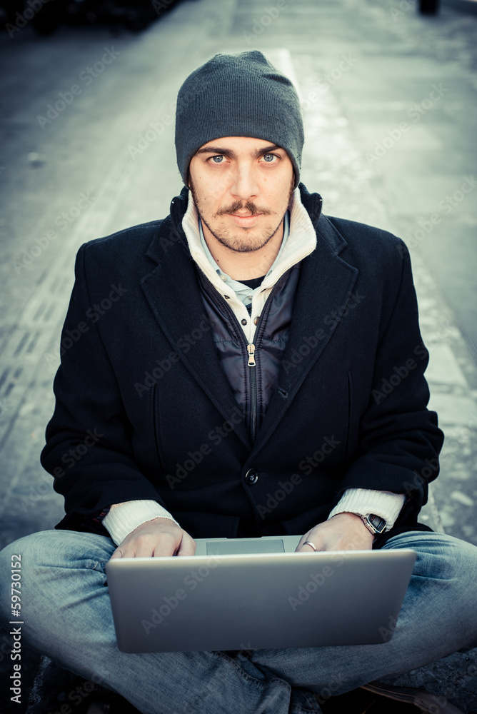 multitasking man using tablet, laptop and cellhpone multitasking man using tablet, laptop and cellhpone