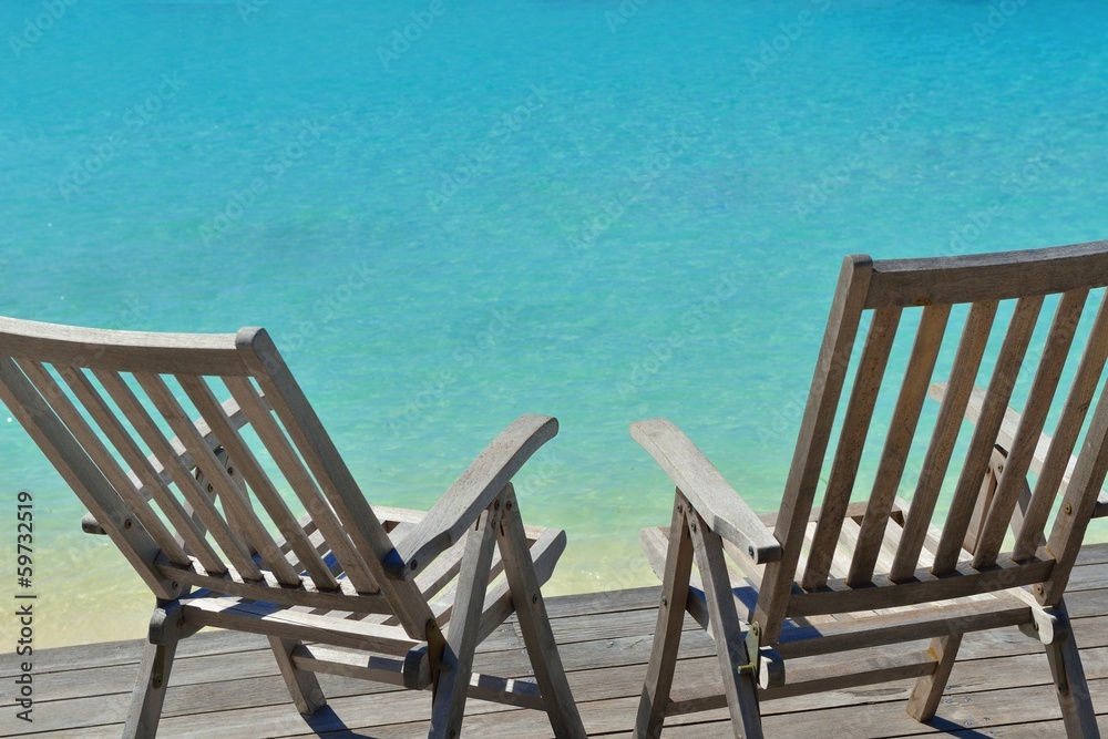 Fototapeta premium tropical beach chairs
