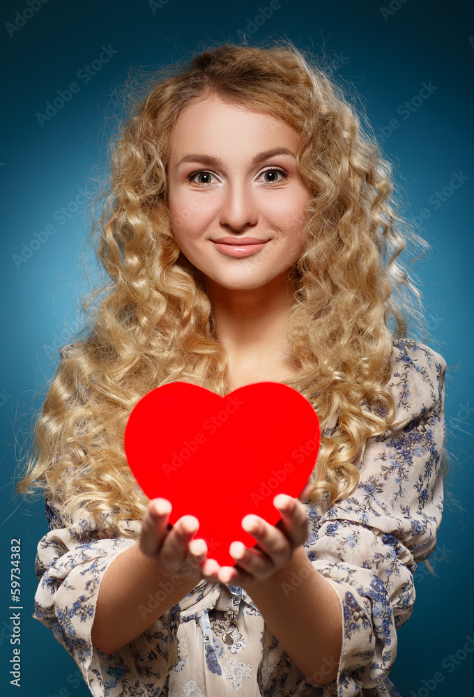Girl with red heart. Concept of Valentine's Day Girl with red heart. Concept of Valentine's Day