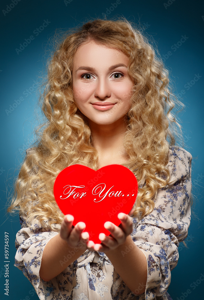 Girl with red heart. Concept of Valentine's Day Girl with red heart. Concept of Valentine's Day