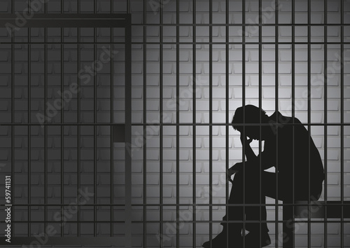 Canvas Print Concept de la prison et de l’arrestation d’un délinquant ou d’un criminel, avec un prisonnier qui assis dans sa cellule qui se tient la tête dans les mains