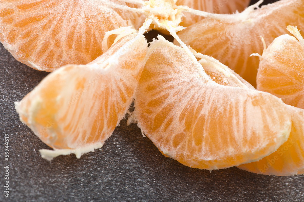 Orange mandarin or tangerine fruit with leaves