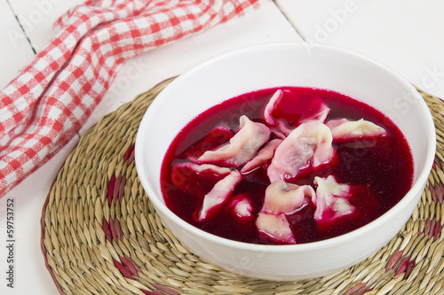 red borscht with dumplings - traditional Polish dish photo