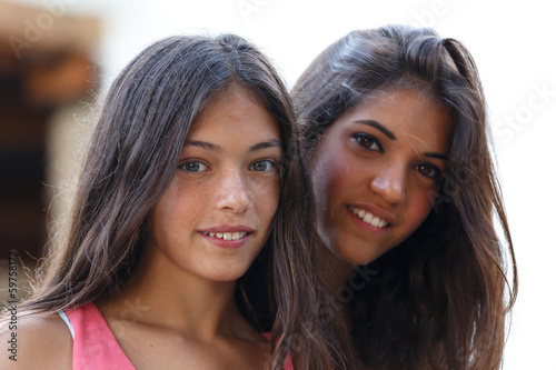 closeup portrait of two girls