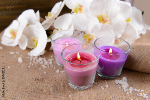 Composition with beautiful colorful candles  sea salt and
