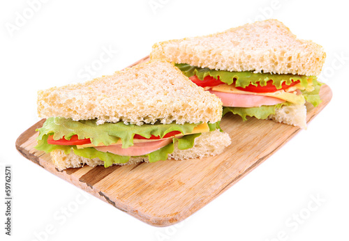 Fresh and tasty sandwiches on cutting board isolated on white