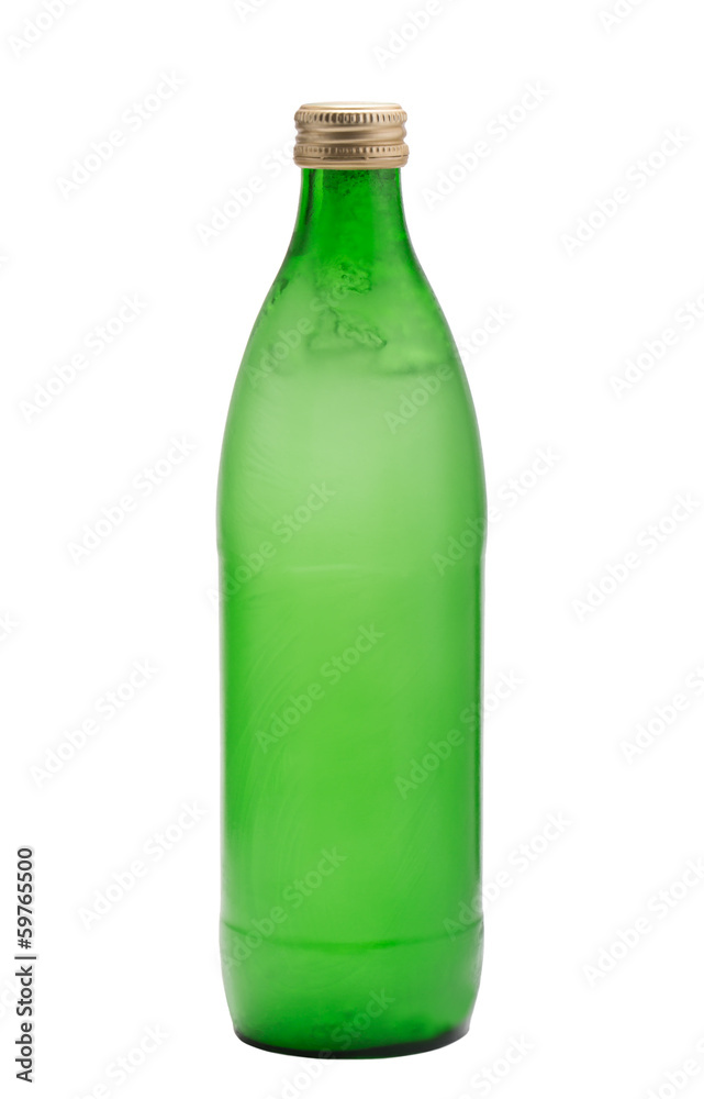 Green glass bottle with frozen water inside Green glass bottle with frozen water inside