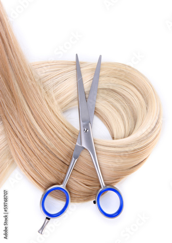 Tablou pe pânză Long blond hair and scissors isolated on white