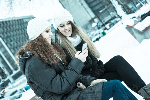 Canvas Print Two Women Sending a Message