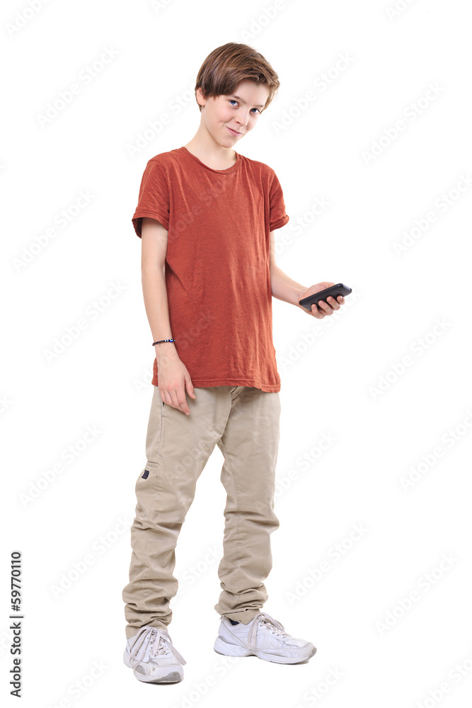male smiling teenager with mobile phone, isolated on white male smiling teenager with mobile phone, isolated on white