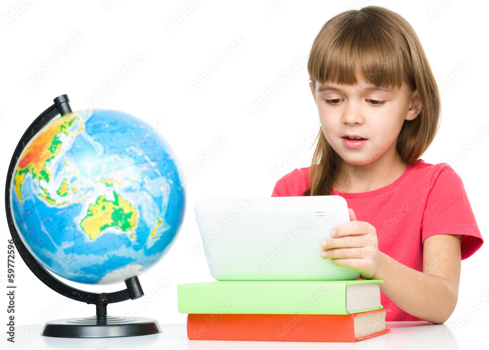 Young girl is using tablet Young girl is using tablet