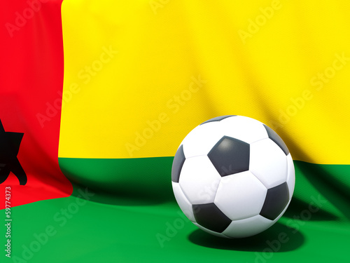 Flag of guinea bissau with football in front of it