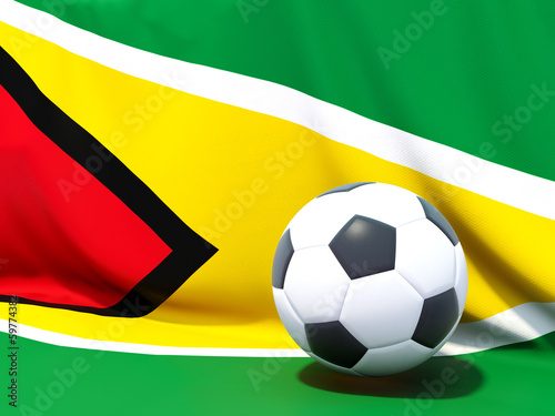 Flag of guyana with football in front of it