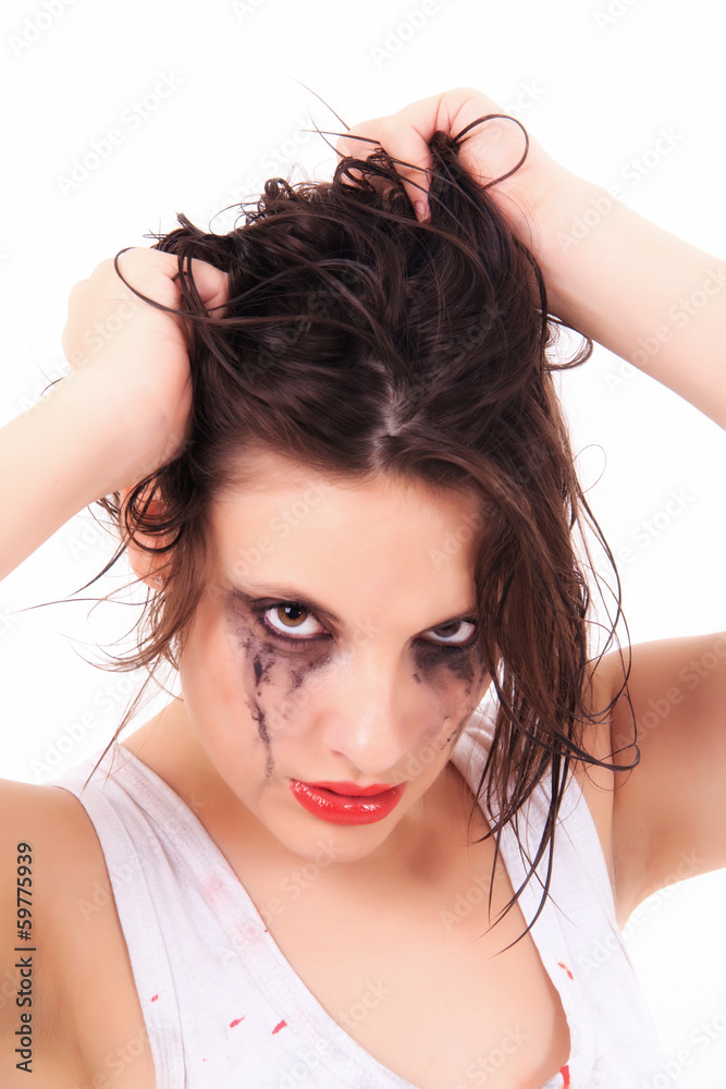 crying young woman with flowed mascara crying young woman with flowed mascara