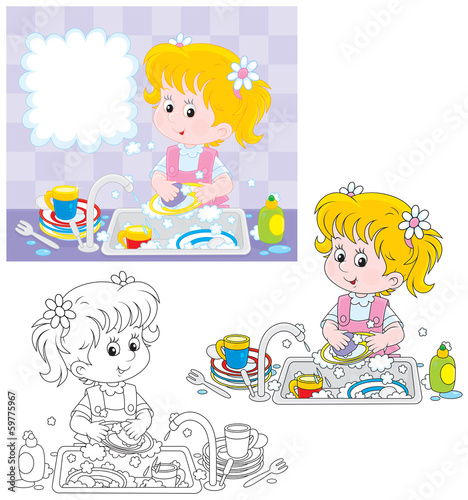 Little girl washing dishes in a kitchen