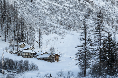 Village in mountain valley, Italy photo