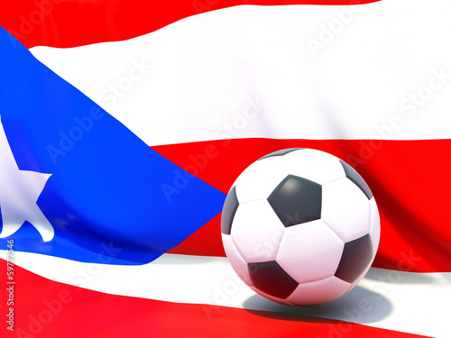 Flag of puerto rico with football in front of it