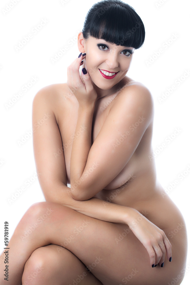 Fototapeta premium Nude Young Lady Sitting on a Stool