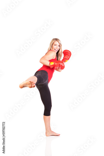 Portrait of pretty young woman doing exercise