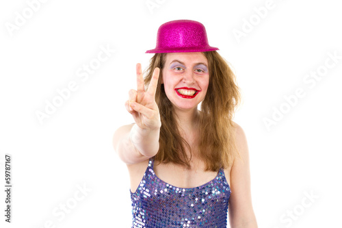 Young woman at party showing v sign photo
