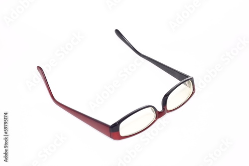 eyeglass on white paper