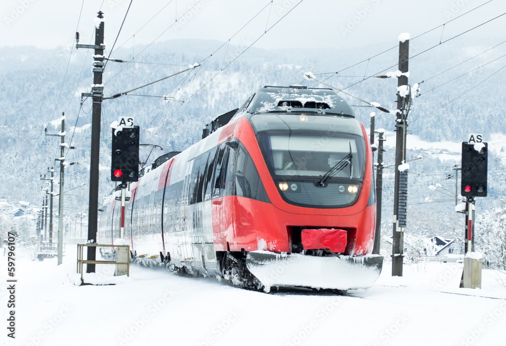 Naklejka premium Red train in winter