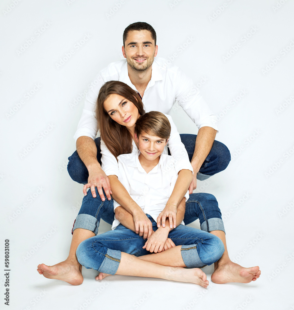 Young happy family on white background Young happy family on white background