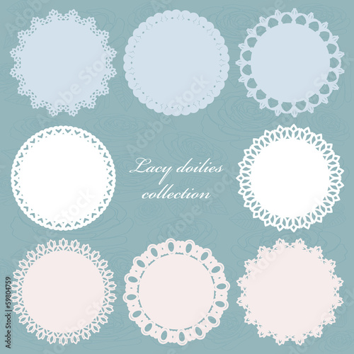 Set of cute lacy doilies on floral background.