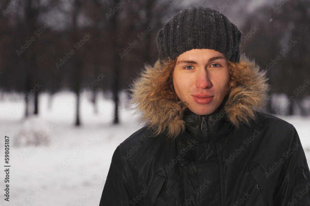 Portrait of young man in the Park at winter Portrait of young man in the Park at winter