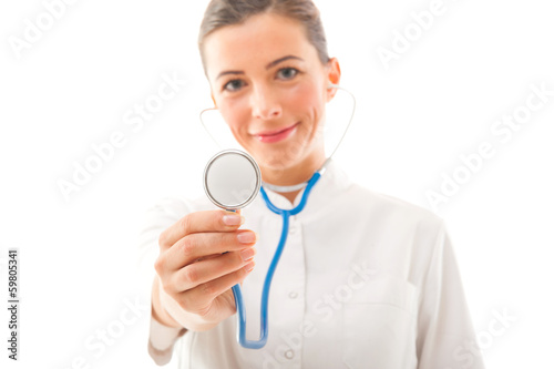 Attractive Smiling doctor show her stethoscope over white backgr