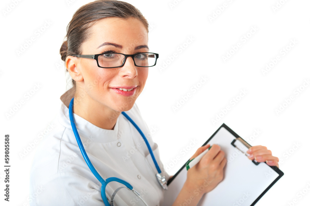 Smiling Female Doctor holds clipboard with white sheet of paper Smiling Female Doctor holds clipboard with white sheet of paper