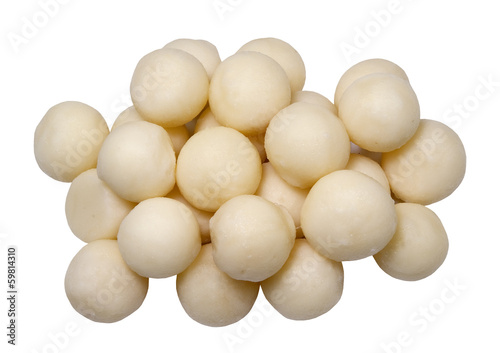 fresh peeled Parisian potatoes on a white background