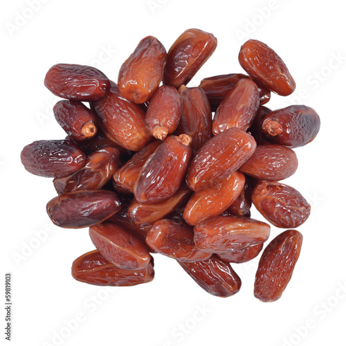 Heap of dried dates on a white background