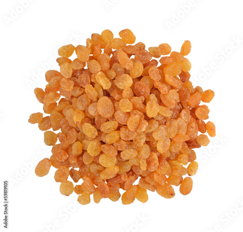 Heap of golden raisins on a white background