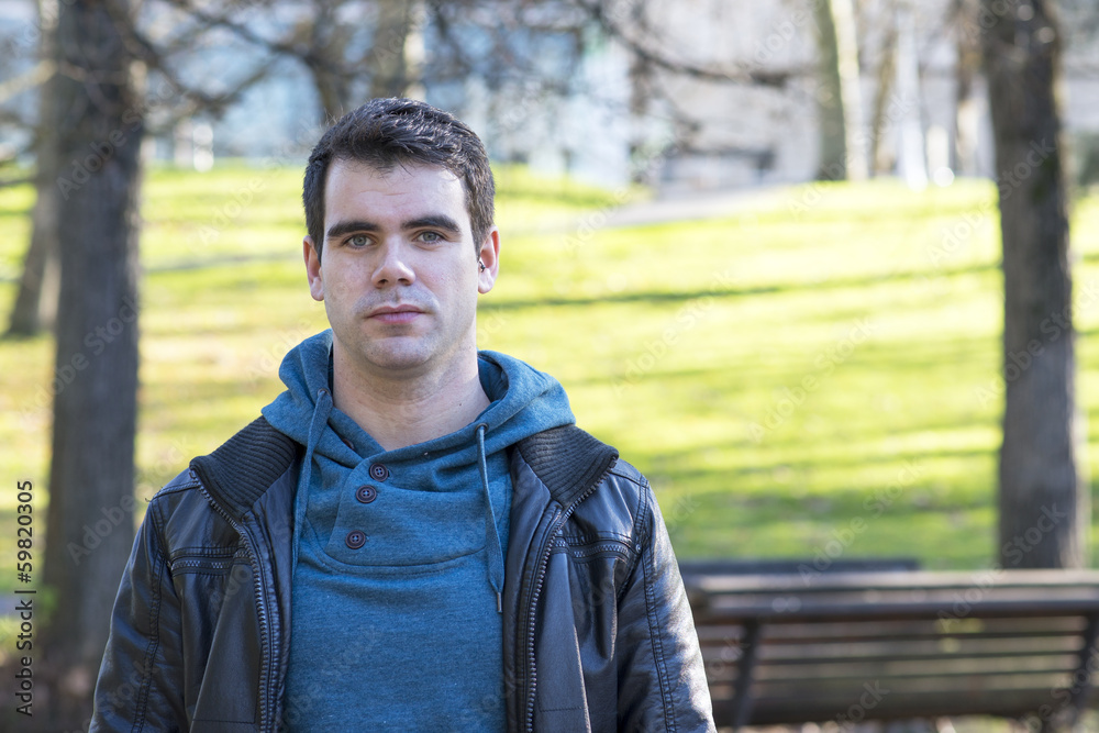 Portrait of serious man looking at the camera, outdoor. Portrait of serious man looking at the camera, outdoor.