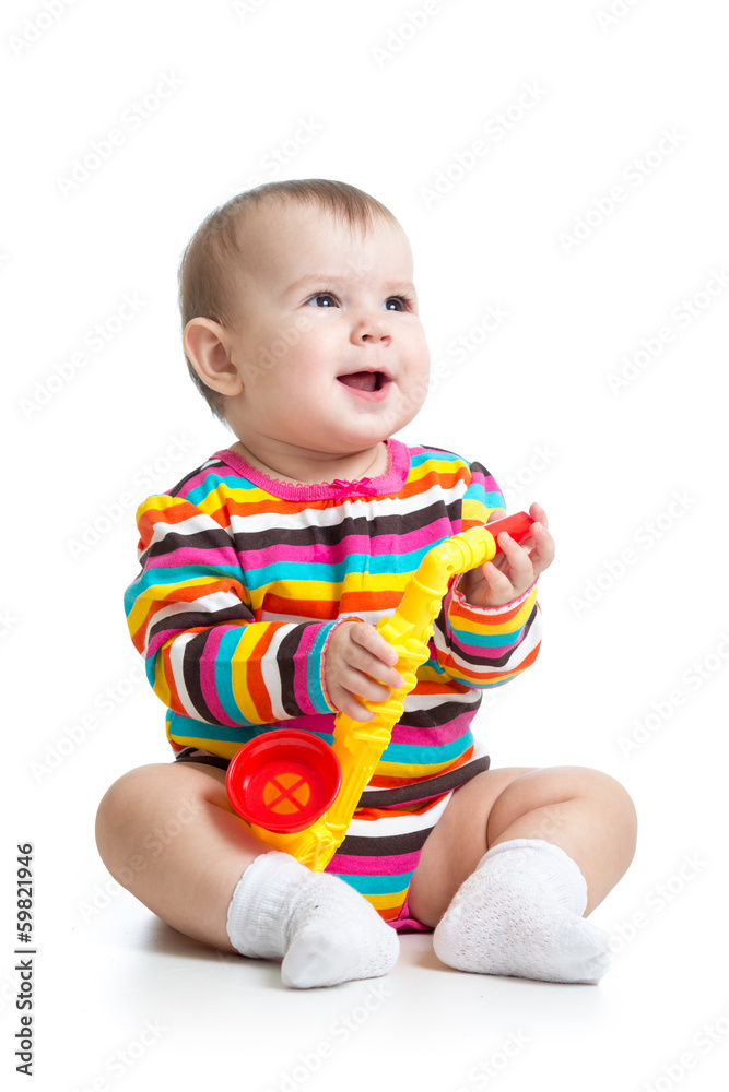 baby girl playing musical toy isolated on white baby girl playing musical toy isolated on white