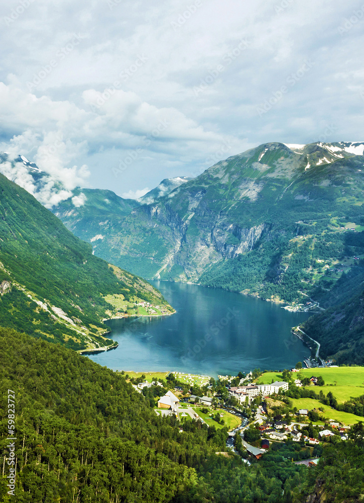 Norway landscape Mountains and village in Geiranger fjord.