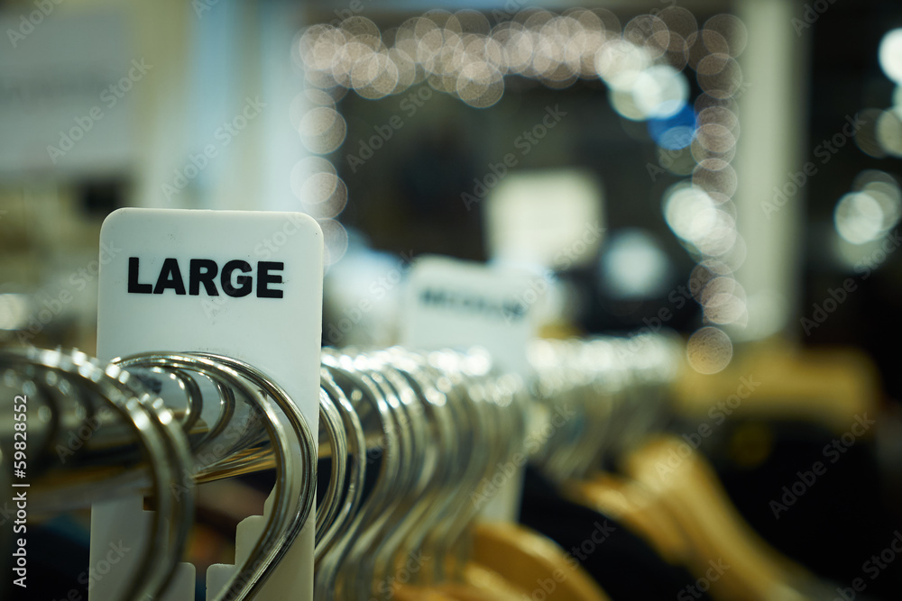 Clothing Tags of Sizes and Numbers at a Second Hand Shop in Boston ...