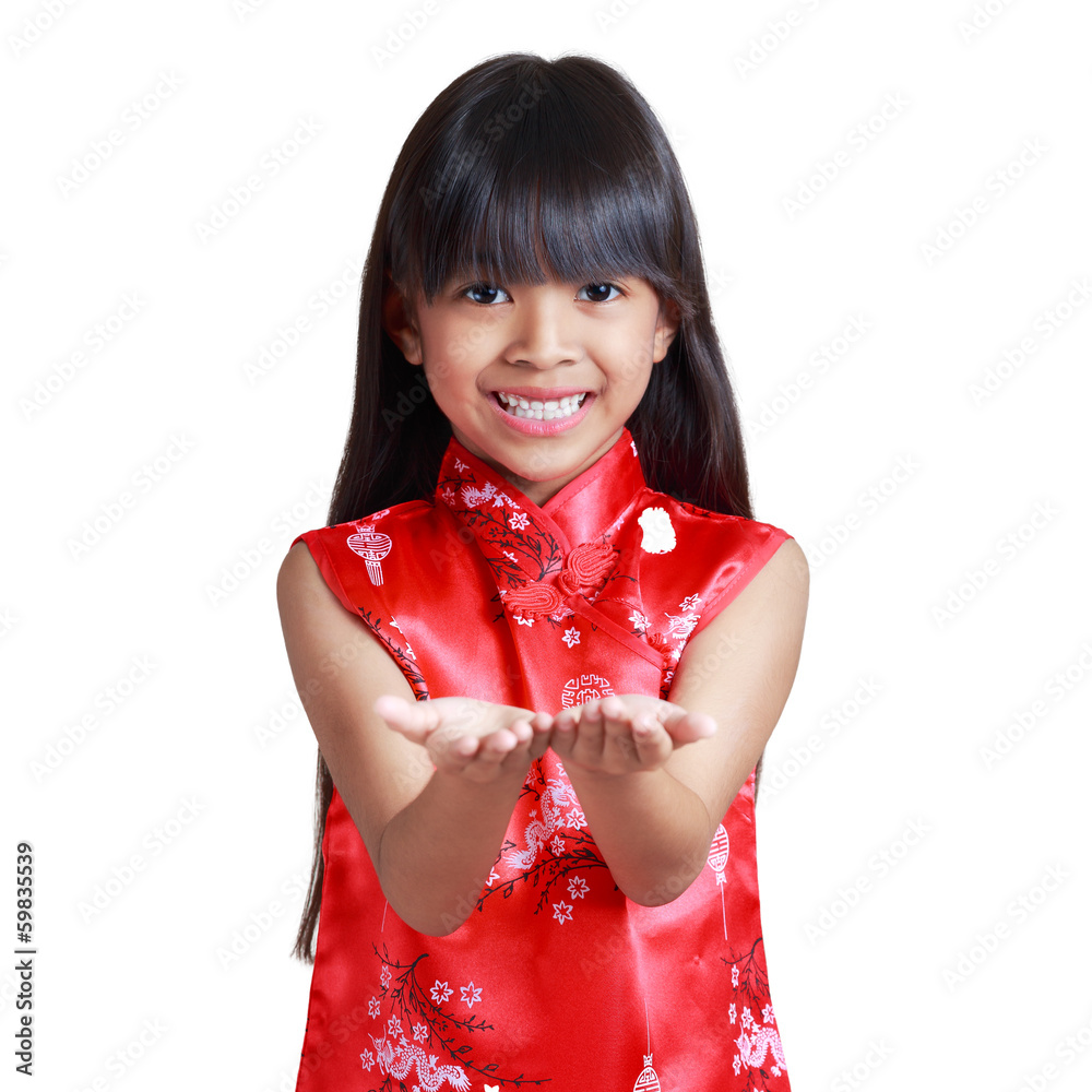 Smiling little asian girl with cheongsam respecting Smiling little asian girl with cheongsam respecting