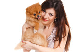 Happy woman with a beautiful dog - isolated over white